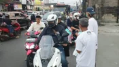 PSI Kabupaten Bogor Bagikan Masker Gratis, Warga Diimbau Waspada Abu Vulkanik